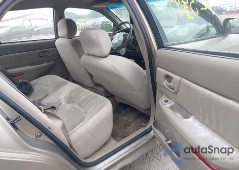 2002 Buick Century Custom z USA, uszkodzony, nr VIN 2G4WS52J921214446